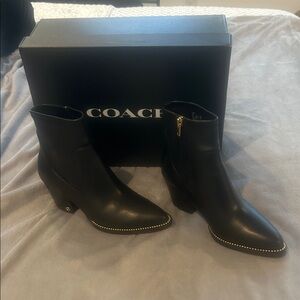 Coach Black Heeled Boots with Gold Accents
